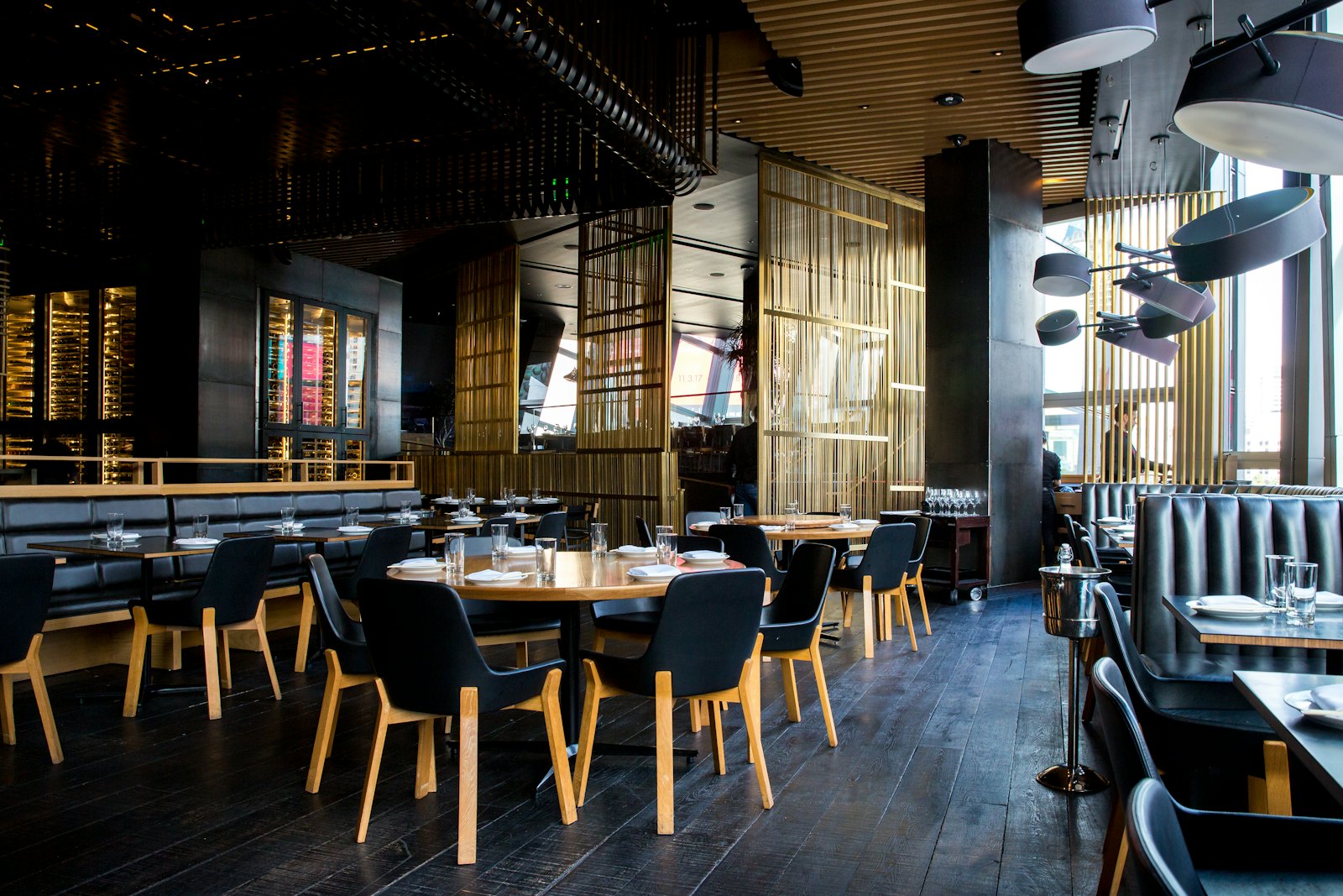 Inside tự do — rattan seating and warm light